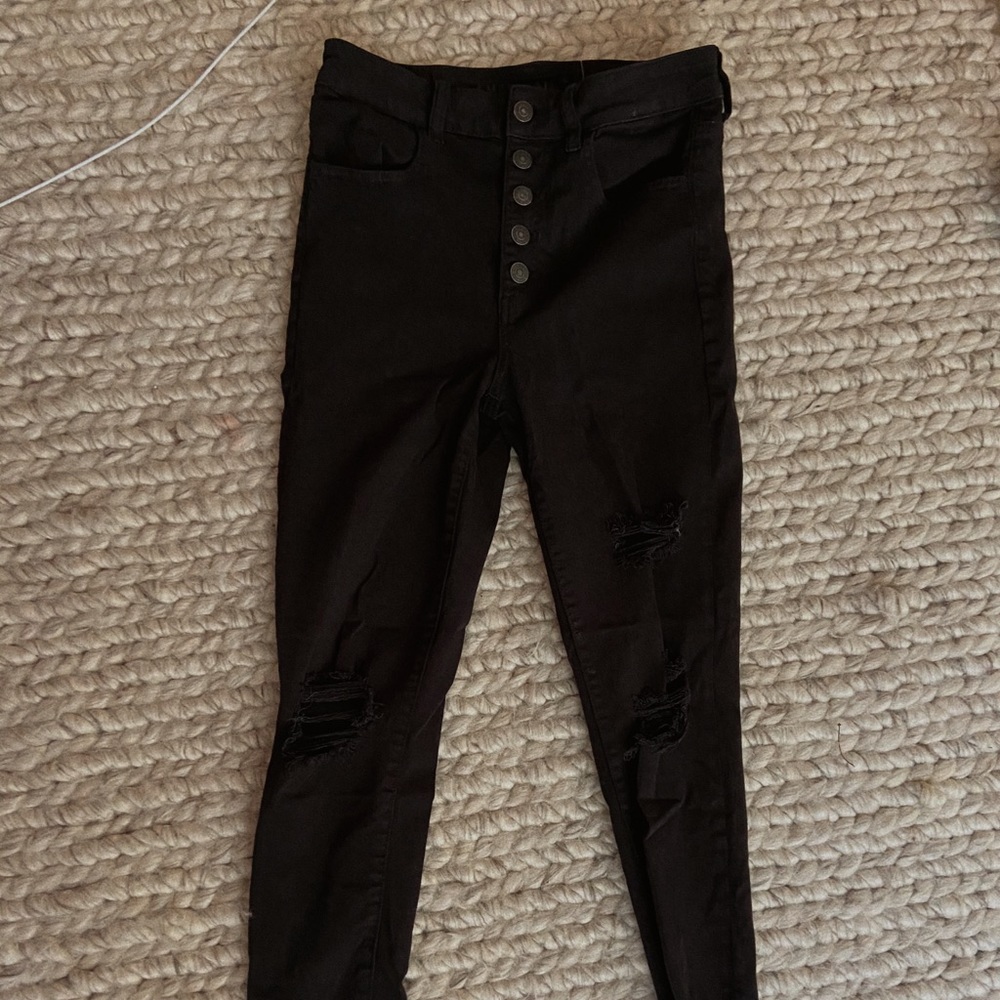 american eagle black high rise button ripped jeans